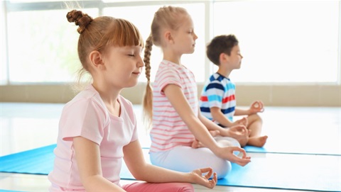 Kids doing yoga