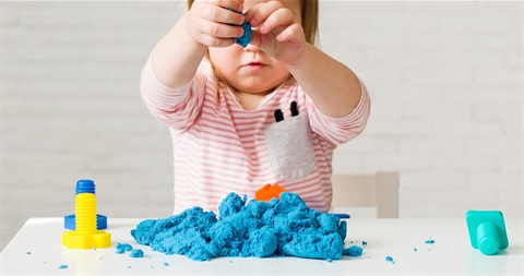 Baby doing STEM sensory activity