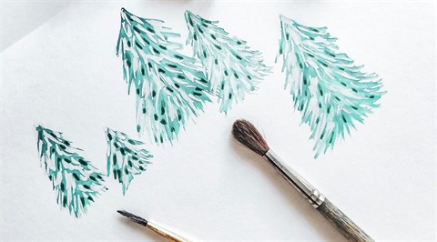 Winter theme painting with paint brushes